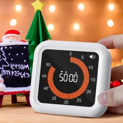 Minuterie ChronoZen posée sur un plan de travail de cuisine moderne à côté d'ustensiles de pâtisserie.