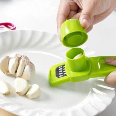 Presse-ail Garlic™ râpe intégrée polyvalent ail gingembre - Cuisinezchezvous.com